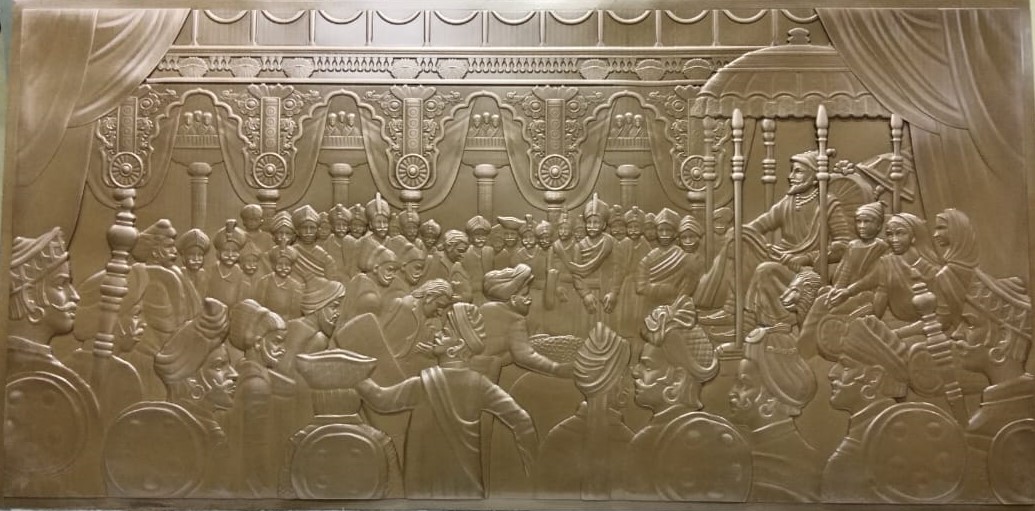 S3 relief mural in a bronze-toned finish